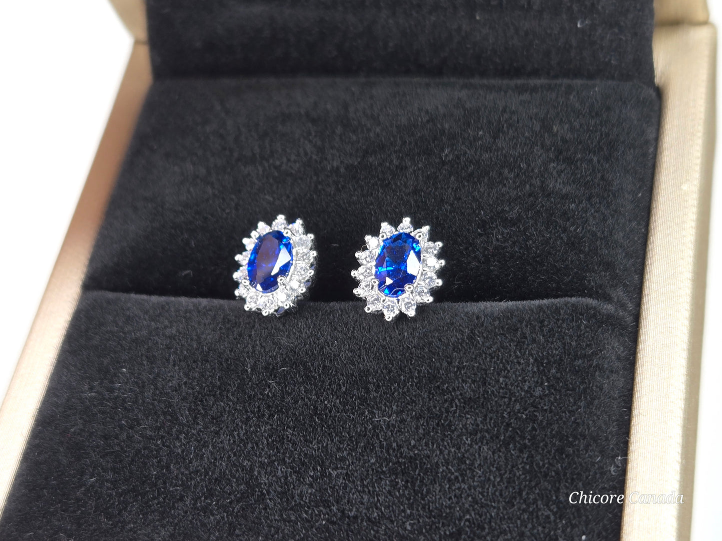 Elegant Royal Blue Sapphire Oval Stud Earrings with Halo of Sparkling Cubic Zirconia