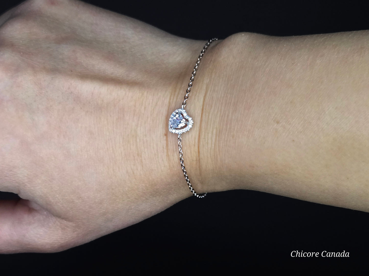 Sterling Silver Bracelet with Sparkling Heart Charm – Elegance Redefined