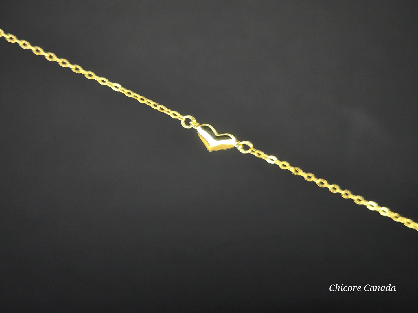 Sterling Silver Adjustable Bracelet With One Delicate Heart-Shaped Charm