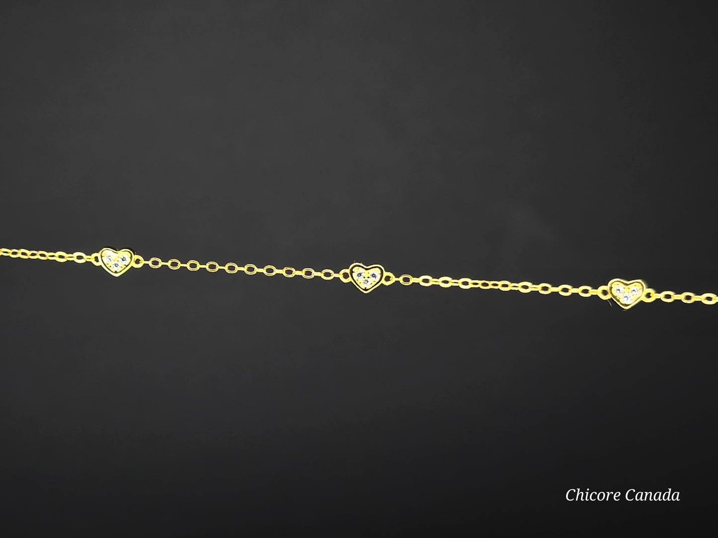 Delicate 925 Sterling Silver Adjustable Bracelet with Three Sparkling Cubic Zirconia Hearts
