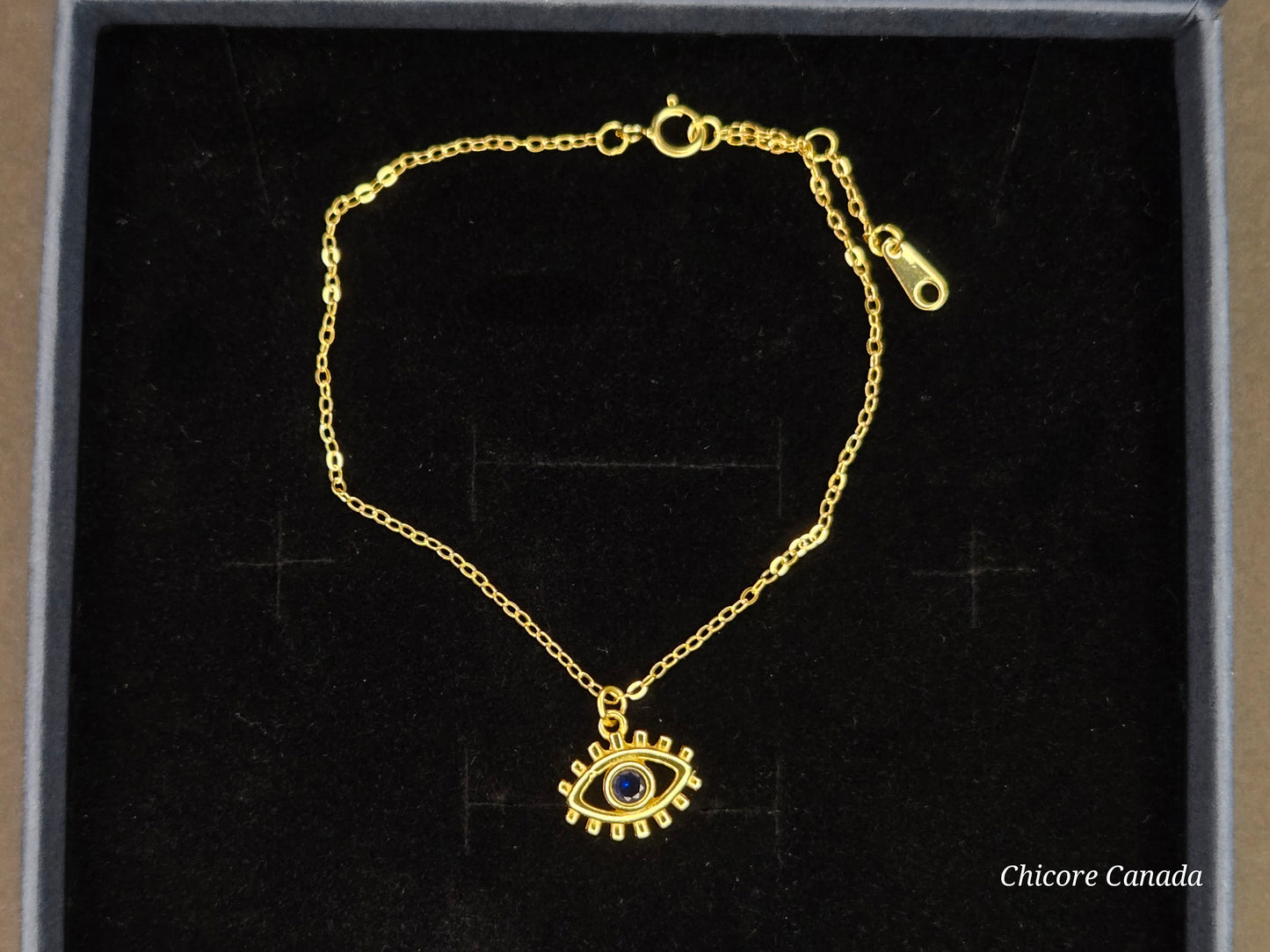 Sterling Silver Adjustable Bracelet with Protective Evil Eye Charm