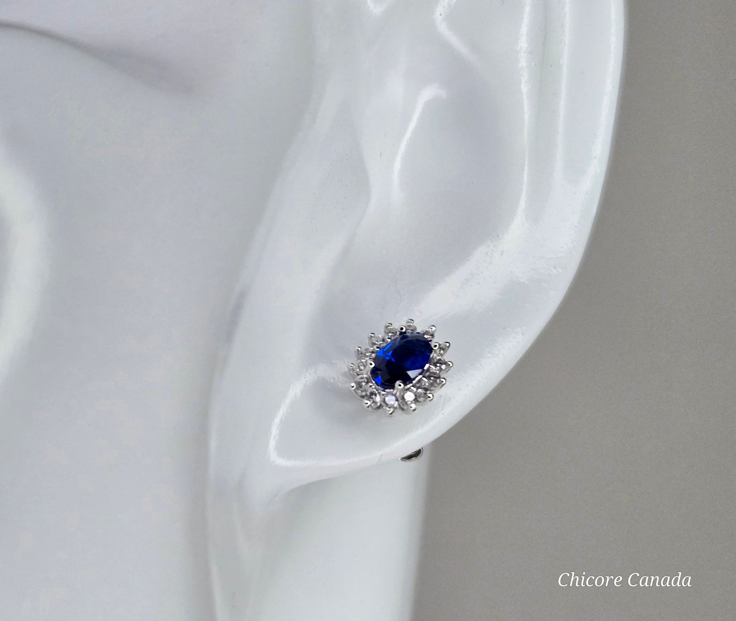 Elegant Royal Blue Sapphire Oval Stud Earrings with Halo of Sparkling Cubic Zirconia