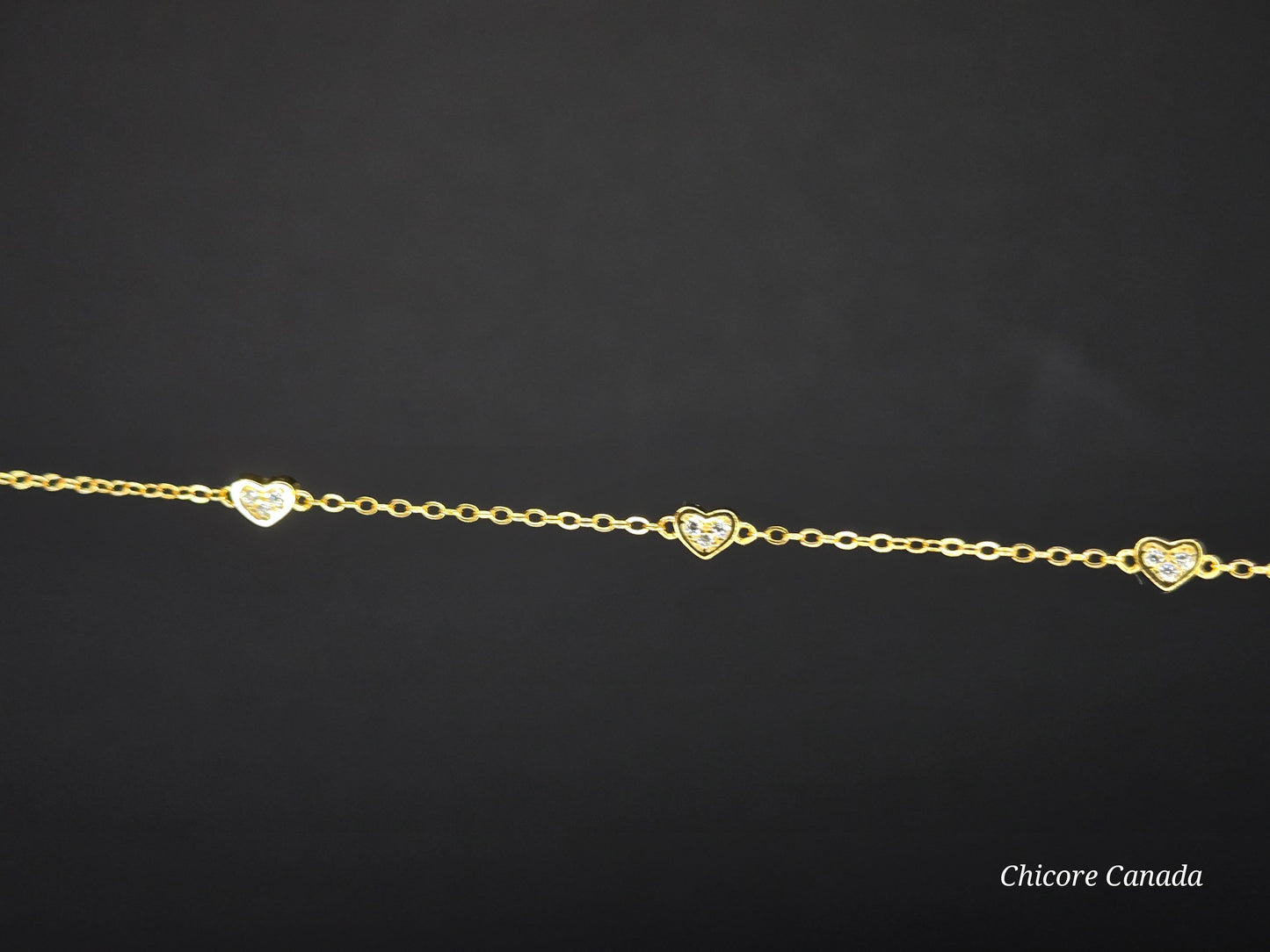 Delicate 925 Sterling Silver Adjustable Bracelet with Three Sparkling Cubic Zirconia Hearts