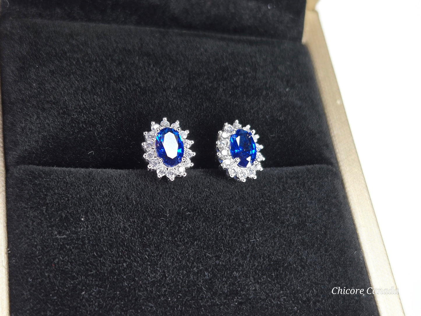 Elegant Royal Blue Sapphire Oval Stud Earrings with Halo of Sparkling Cubic Zirconia
