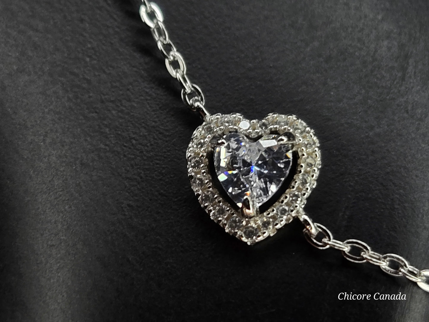 Sterling Silver Bracelet with Sparkling Heart Charm – Elegance Redefined