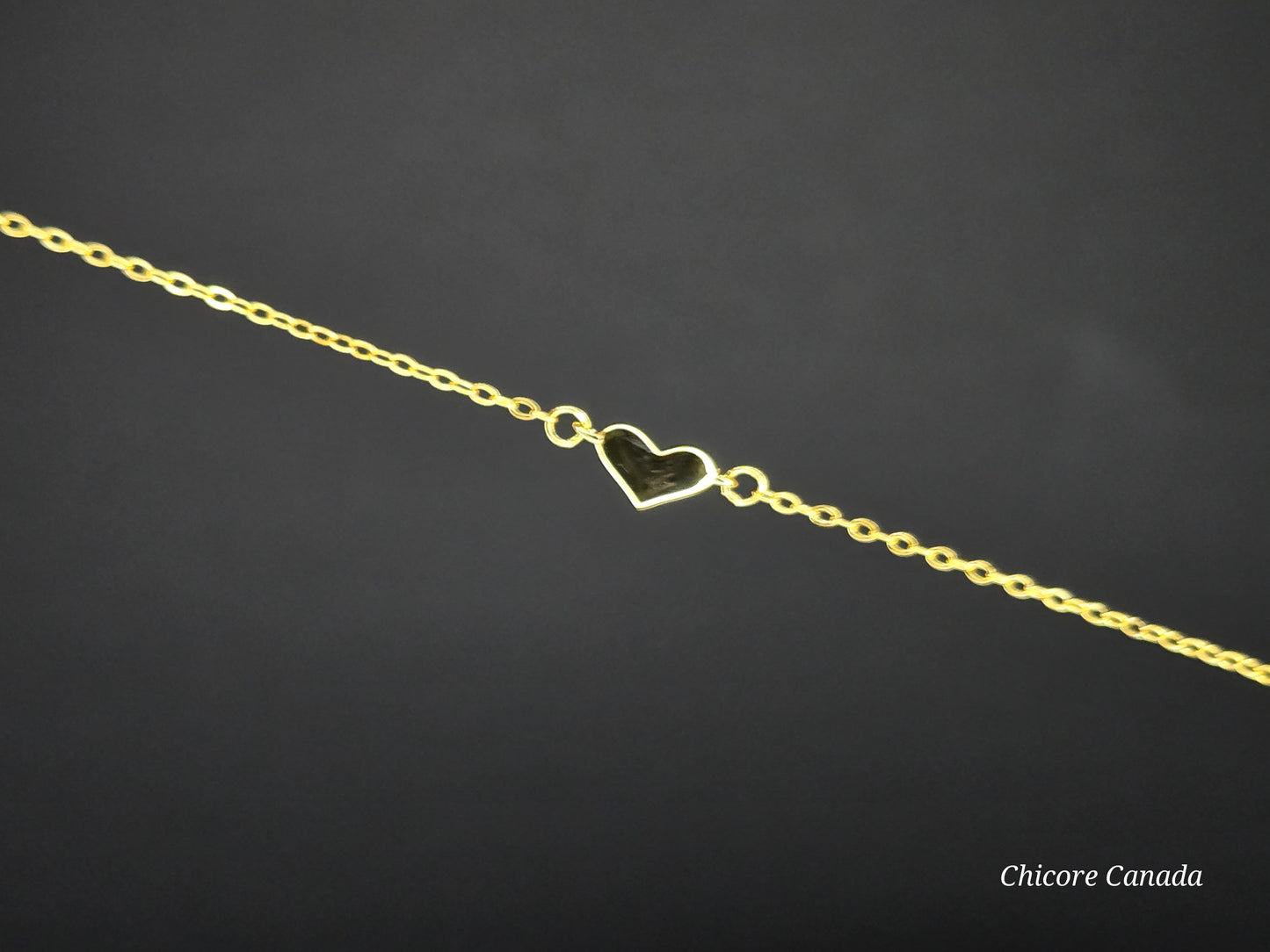 Sterling Silver Adjustable Bracelet With One Delicate Heart-Shaped Charm