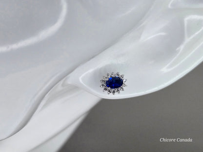 Elegant Royal Blue Sapphire Oval Stud Earrings with Halo of Sparkling Cubic Zirconia