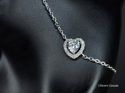 Sterling Silver Bracelet with Sparkling Heart Charm – Elegance Redefined
