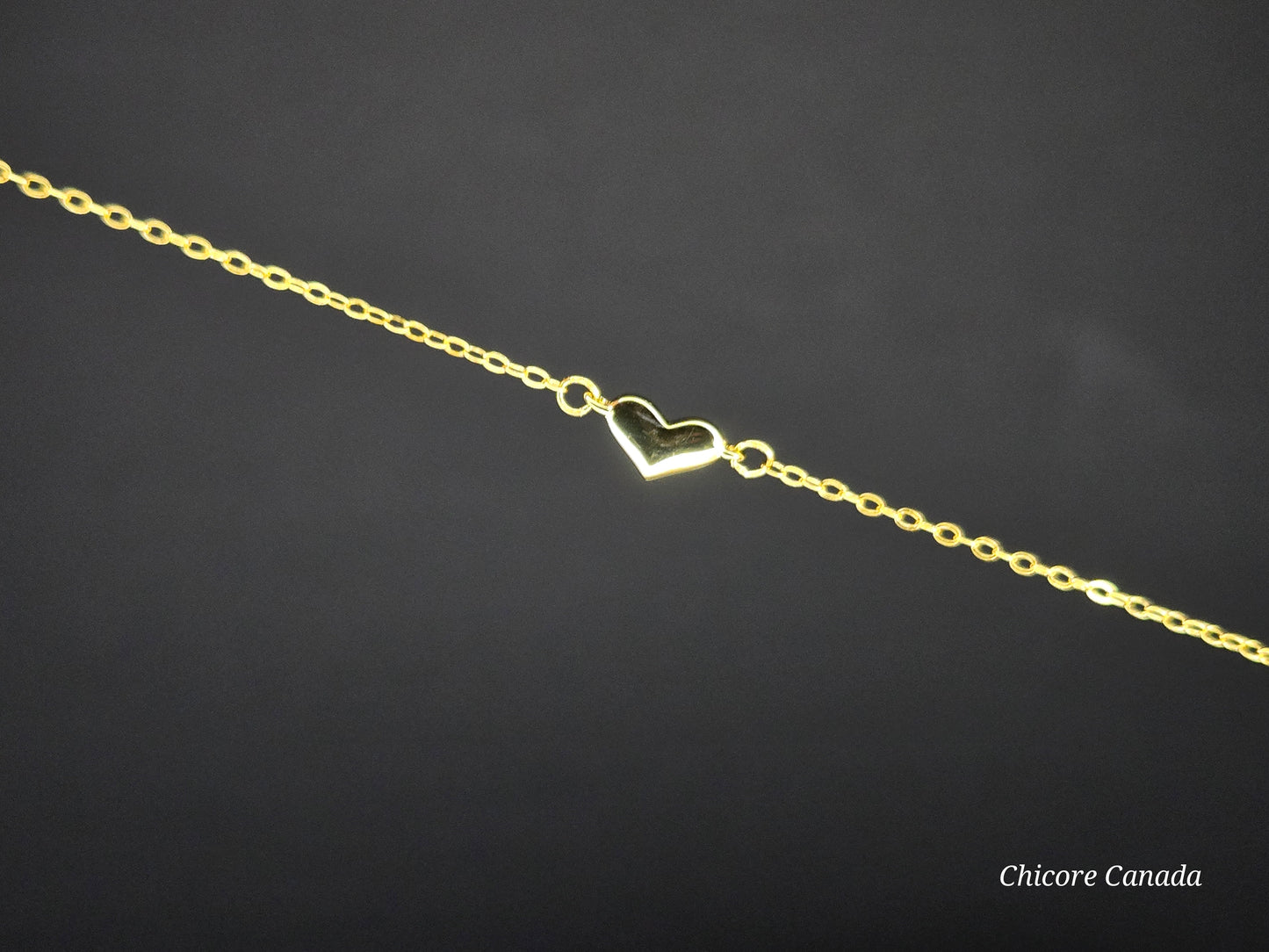 Sterling Silver Adjustable Bracelet With One Delicate Heart-Shaped Charm