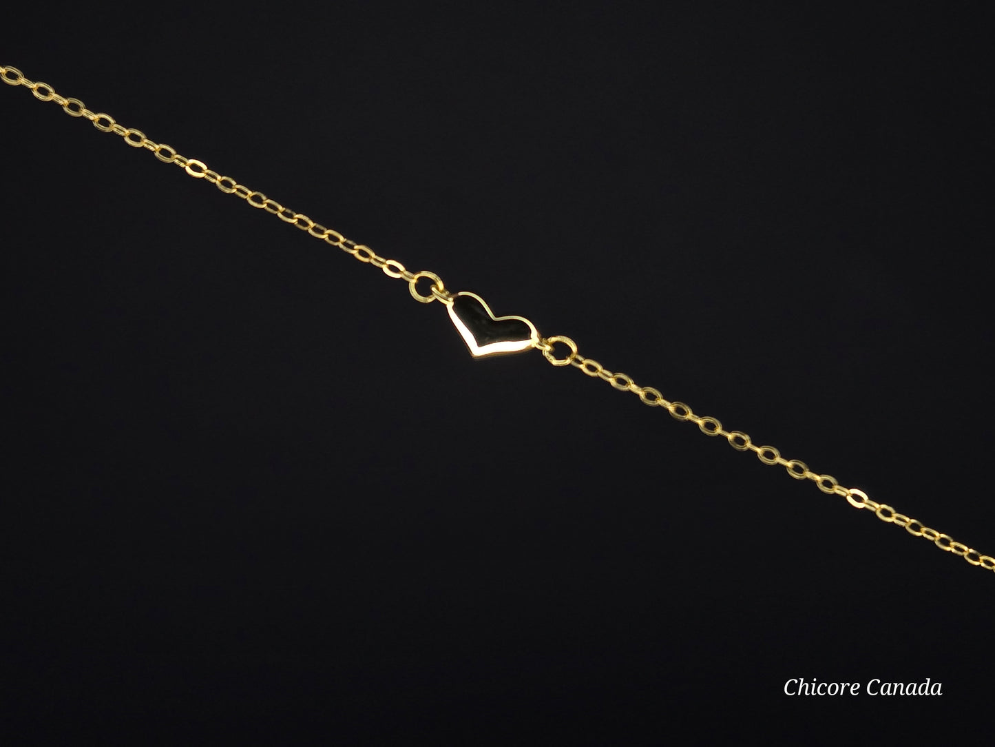 Sterling Silver Adjustable Bracelet With One Delicate Heart-Shaped Charm