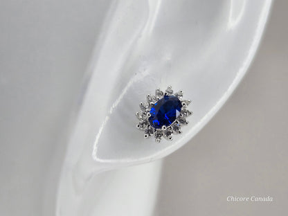 Elegant Royal Blue Sapphire Oval Stud Earrings with Halo of Sparkling Cubic Zirconia