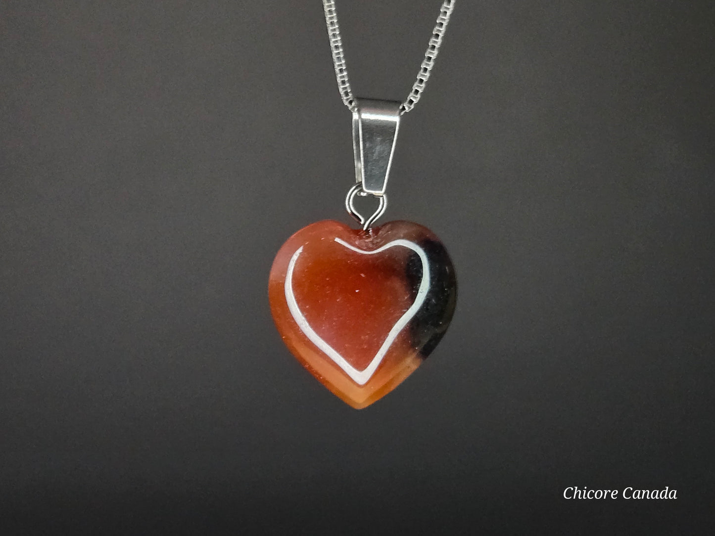 Eternal Glow: Handcrafted Heart-Shaped Carnelian Pendant with Adjustable Necklace